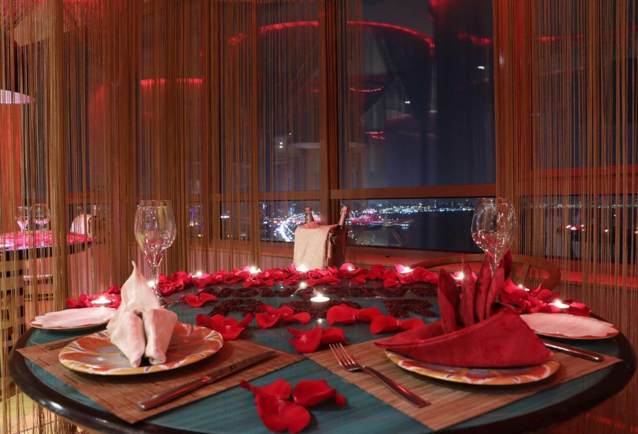 Symphony Style Hotel Kuwait Salmiya Extérieur photo A table set for a romantic dinner